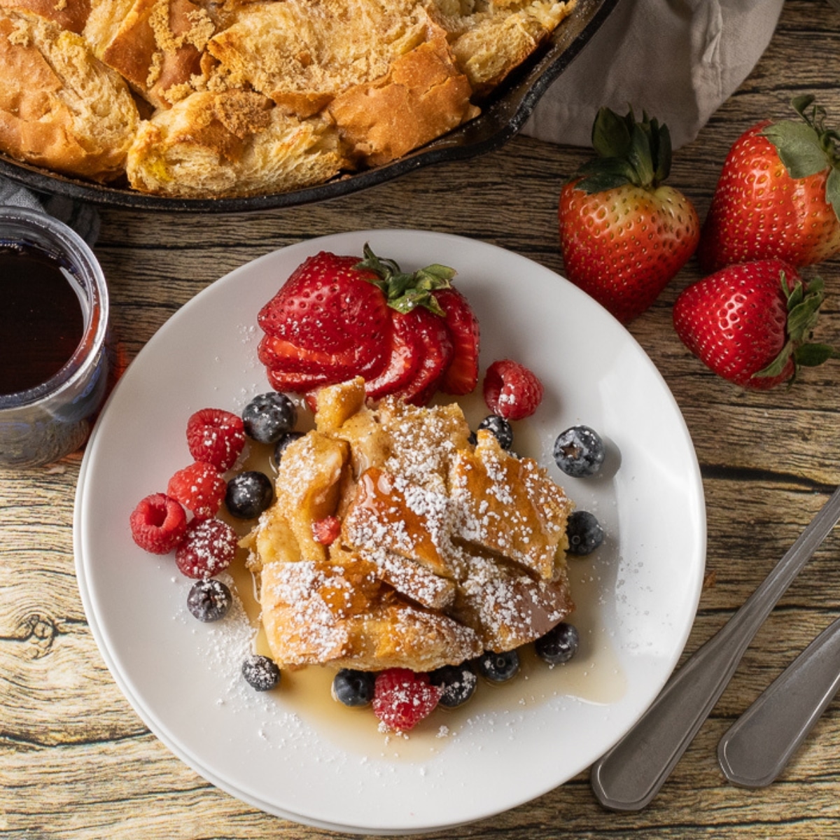 french toast casserole piece on a white plate