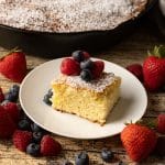 soft butter cake topped with fresh fruit