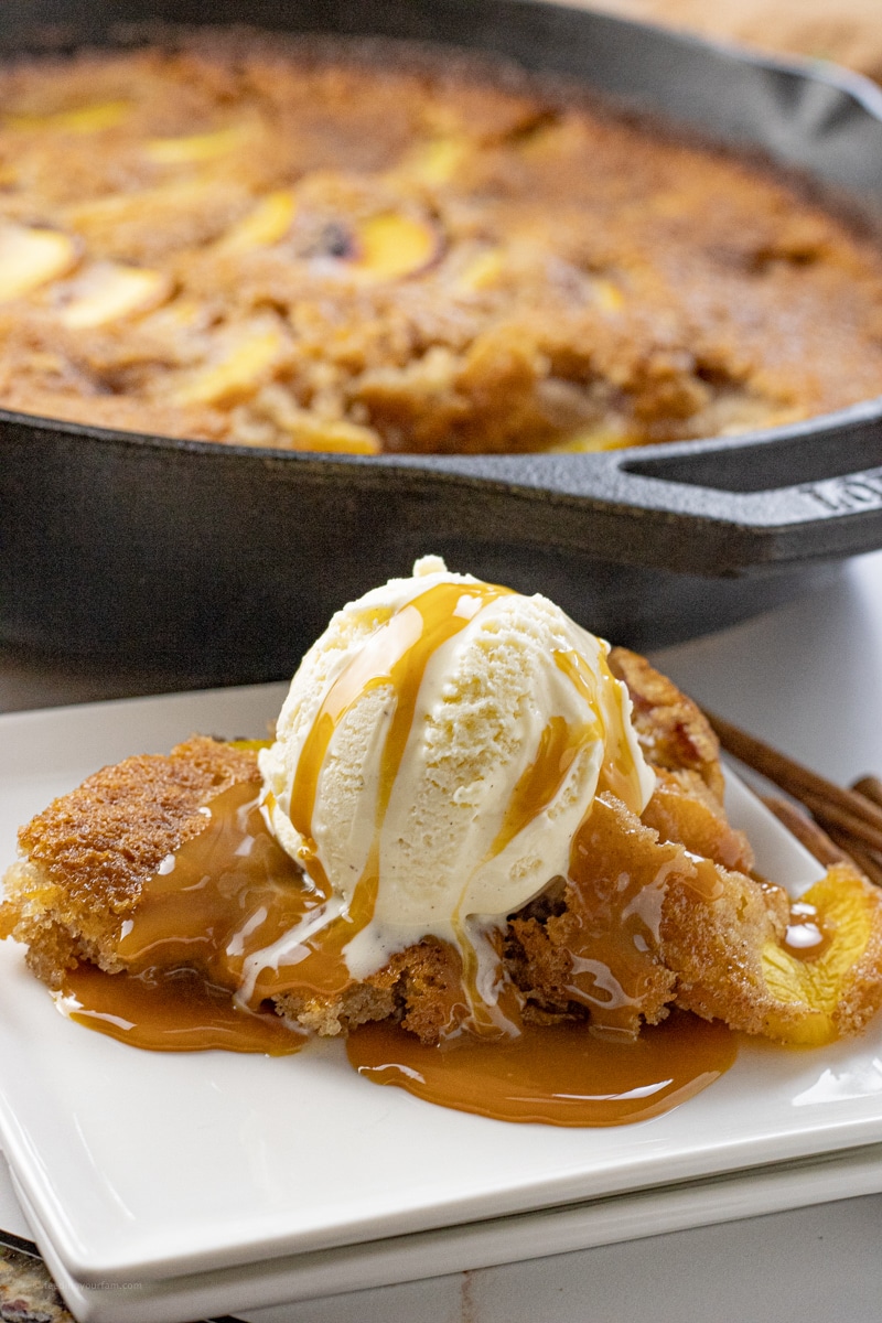 peach crisp topped with ice cream