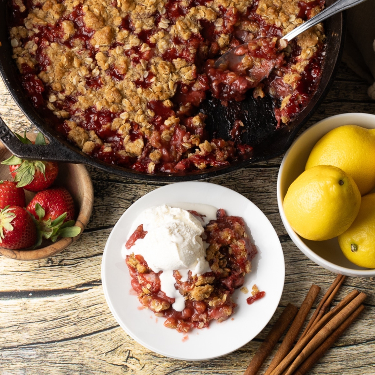 strawberry crumble recipe in a cast iron skillet