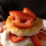 strawberry shortcake biscuits topped with whipped cream and strawberries