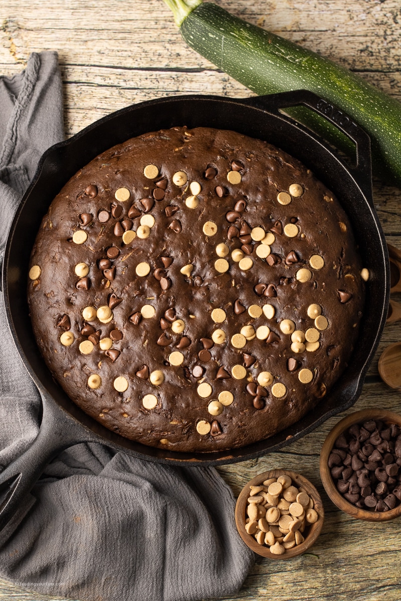 chocolate peanut butter chip zucchini bread in a cast iron skillet