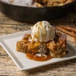 thinly sliced apples baked in a sweet cake batter right in a cast iron skillet