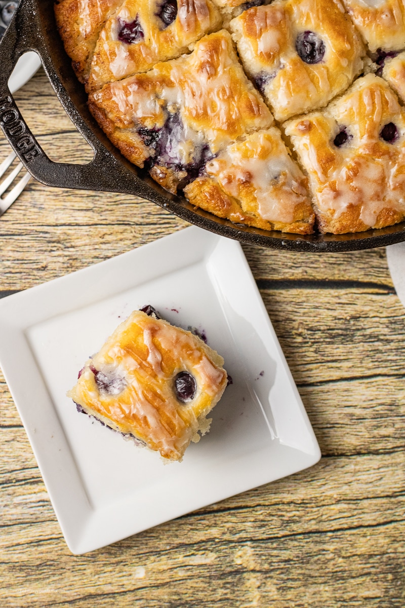 soft blueberry biscuits in a cast iron skillet