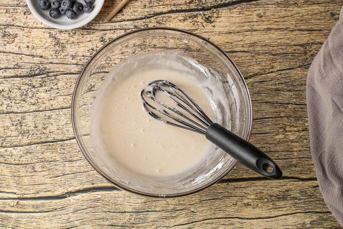 vanilla icing in a small mixing bowl
