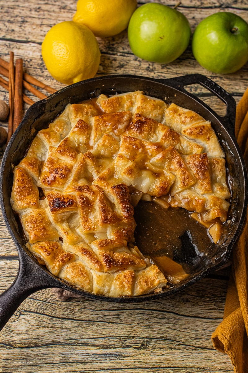 puff pastry apple pie baked in a cast iron skillet.