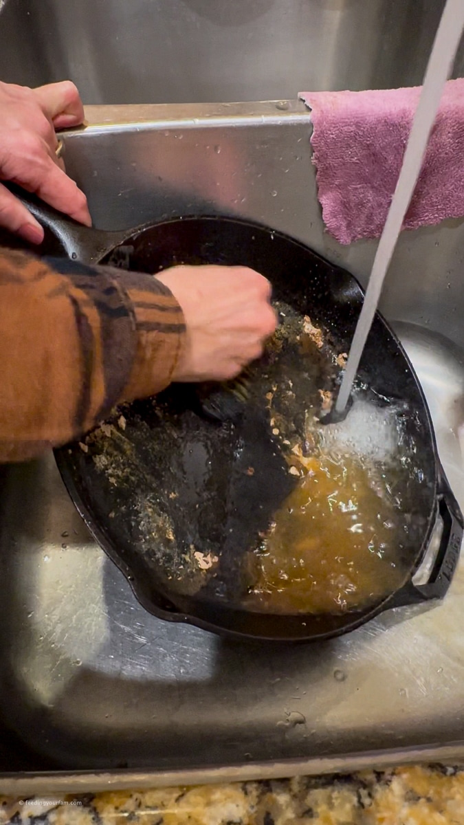 cleaning a cast iron skillet with soap and water