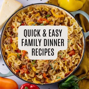 pasta dish with sliced peppers, bowtie pasta and sausage.