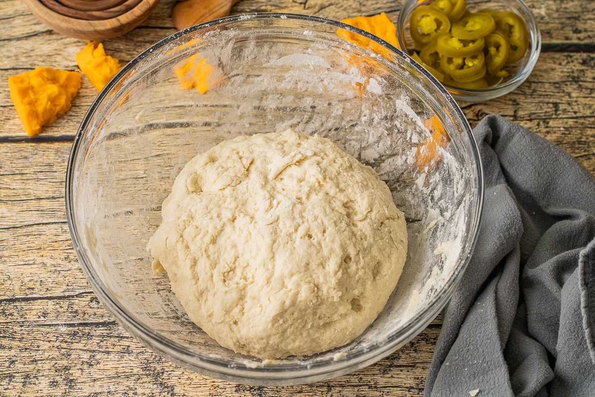 bread dough in a glass bowl