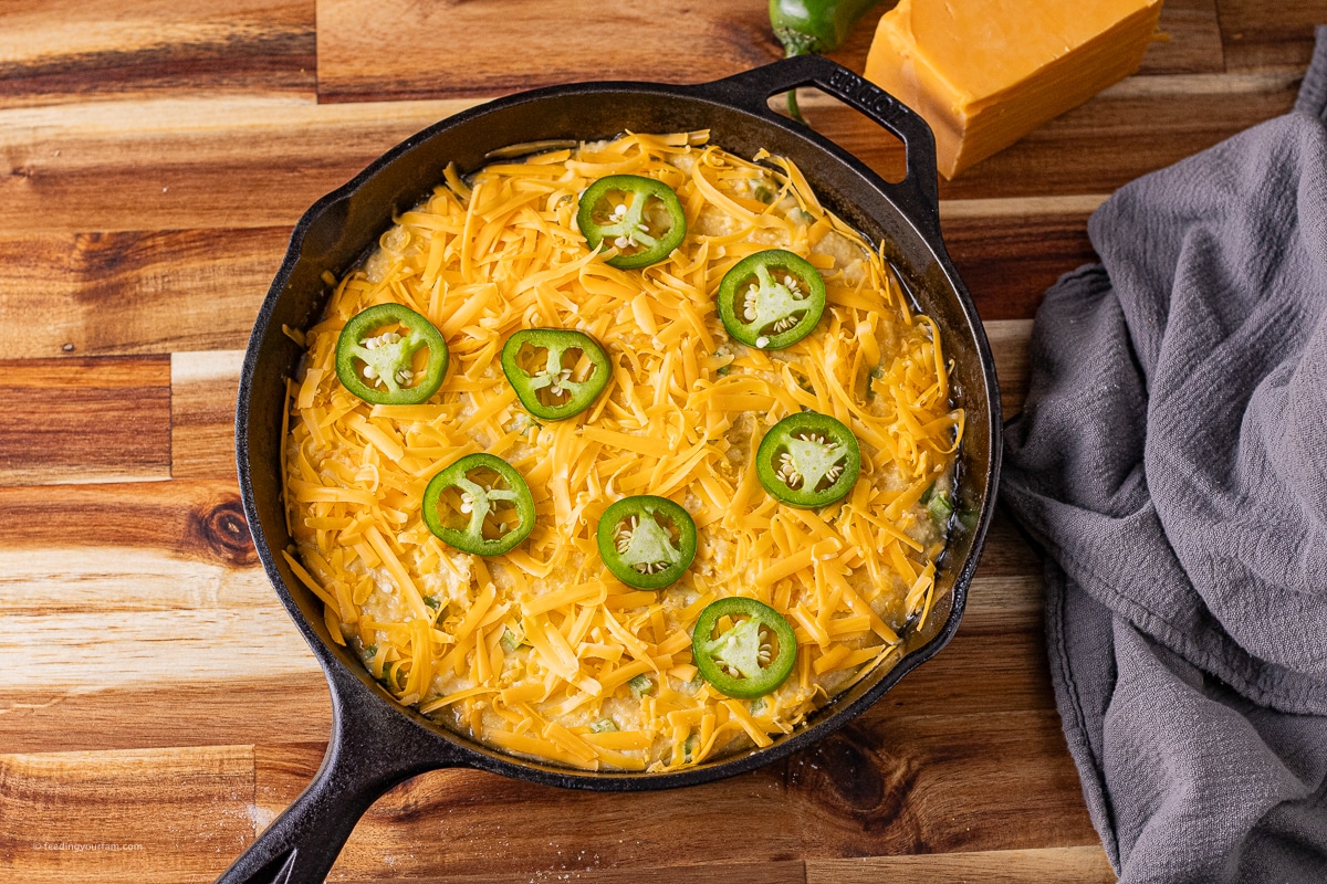 jalapeno cheddar cheese bread in a cast iron skillet