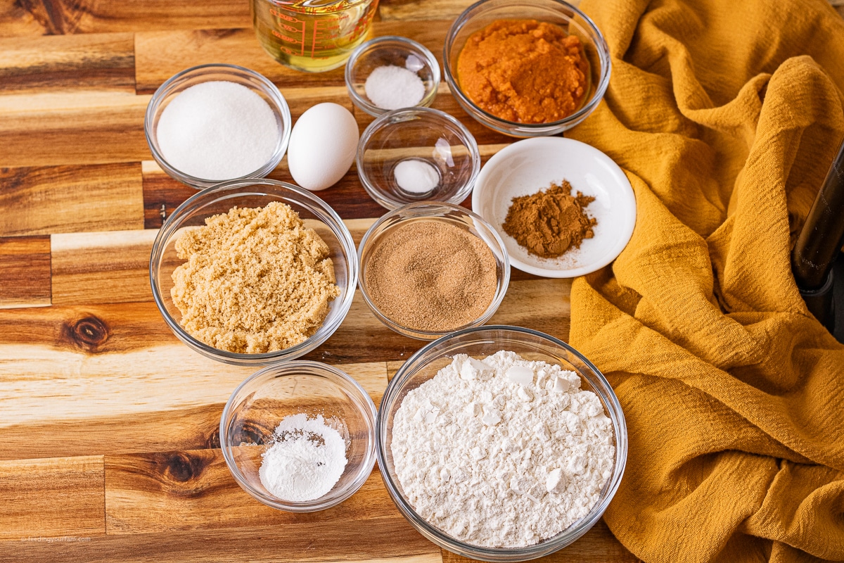 ingredients in small glass bowls to make a cast iron skillet pumpkin bread recipe